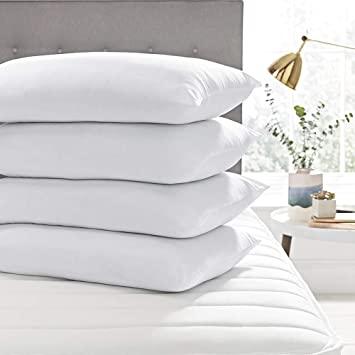 4 pillows hotsell on bed